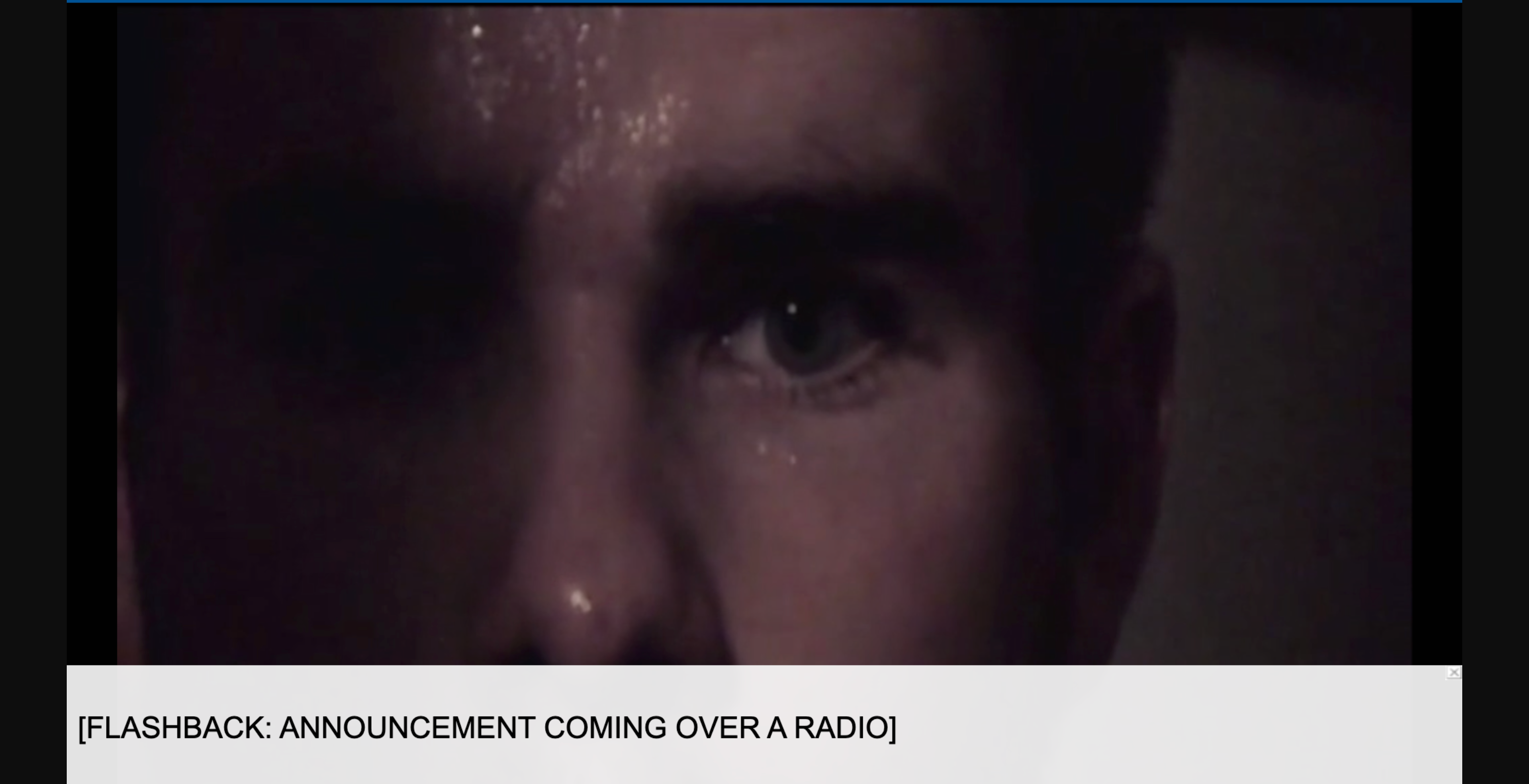 Screenshot of the PTSD video with a closed caption that reads, “[flashback: announcement coming over a radio]”